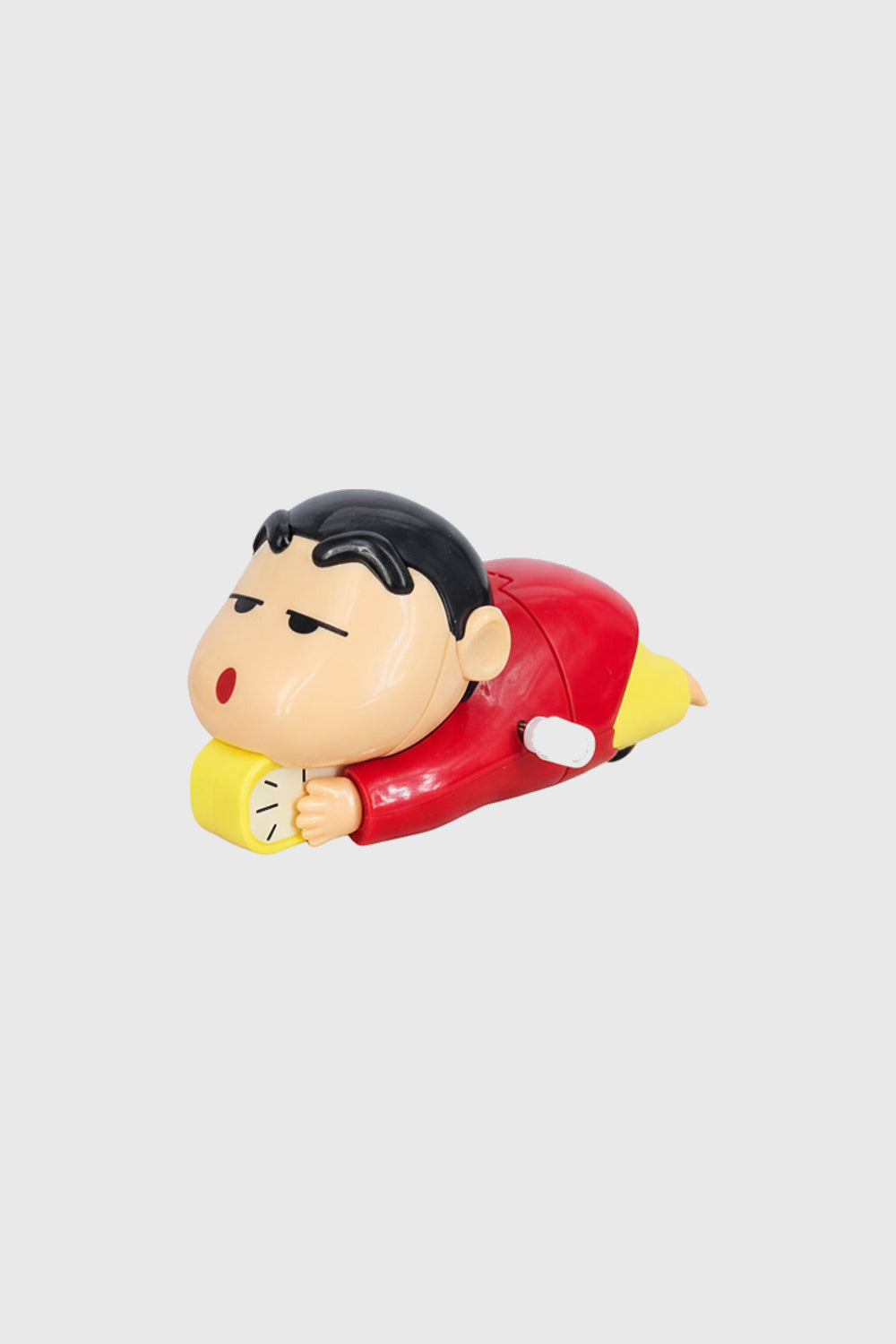 Shinchan collectible crawling figure holding yellow pillow