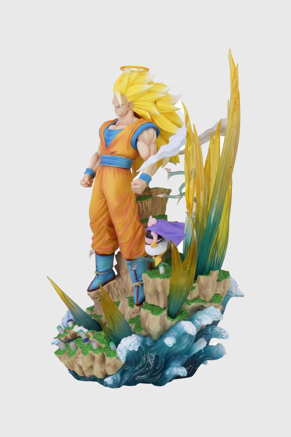 Colorful figurine of a character with spiky hair on a rocky platform with plants.