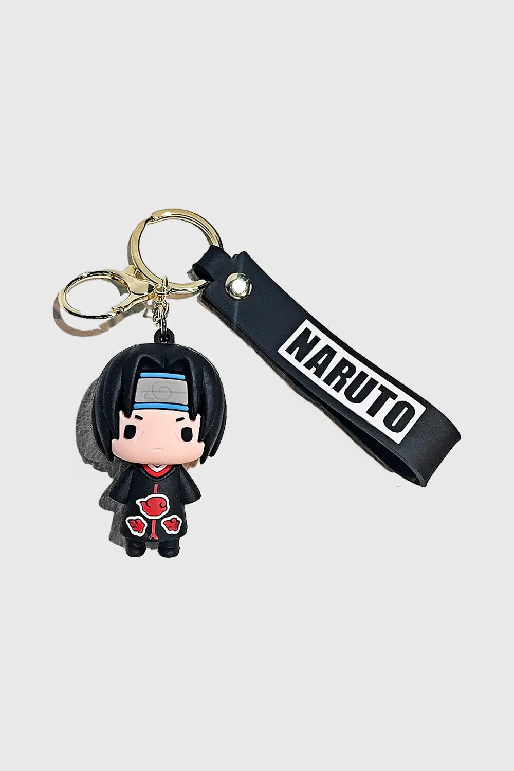 Carry the legacy of Itachi Uchiha with this Naruto-inspired 3D PVC keychain. Made from durable, high-quality PVC, this keychain features Itachi in his signature Akatsuki cloak, along with a black "Naruto" wrist strap for added convenience. Perfect for key