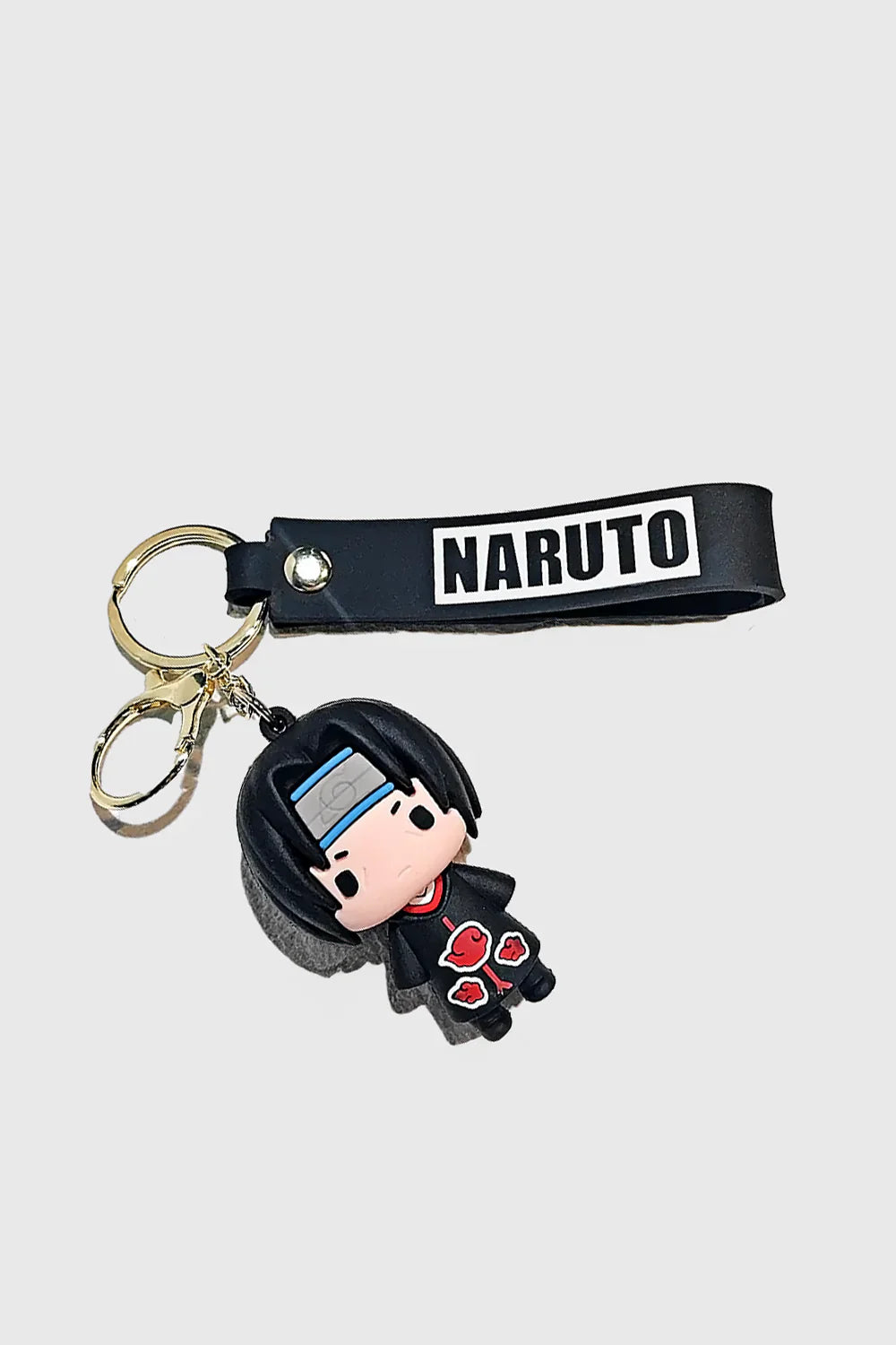 Carry the legacy of Itachi Uchiha with this Naruto-inspired 3D PVC keychain. Made from durable, high-quality PVC, this keychain features Itachi in his signature Akatsuki cloak, along with a black "Naruto" wrist strap for added convenience. Perfect for key