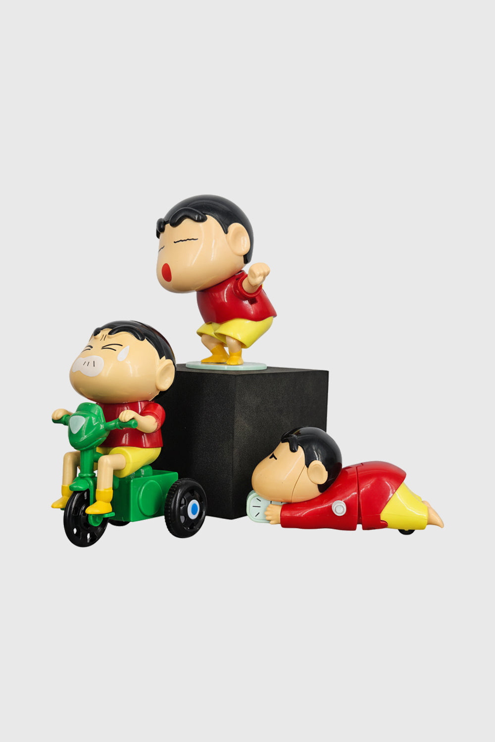 Shinchan mechanical crawling and cycling toy figures with standing figurine