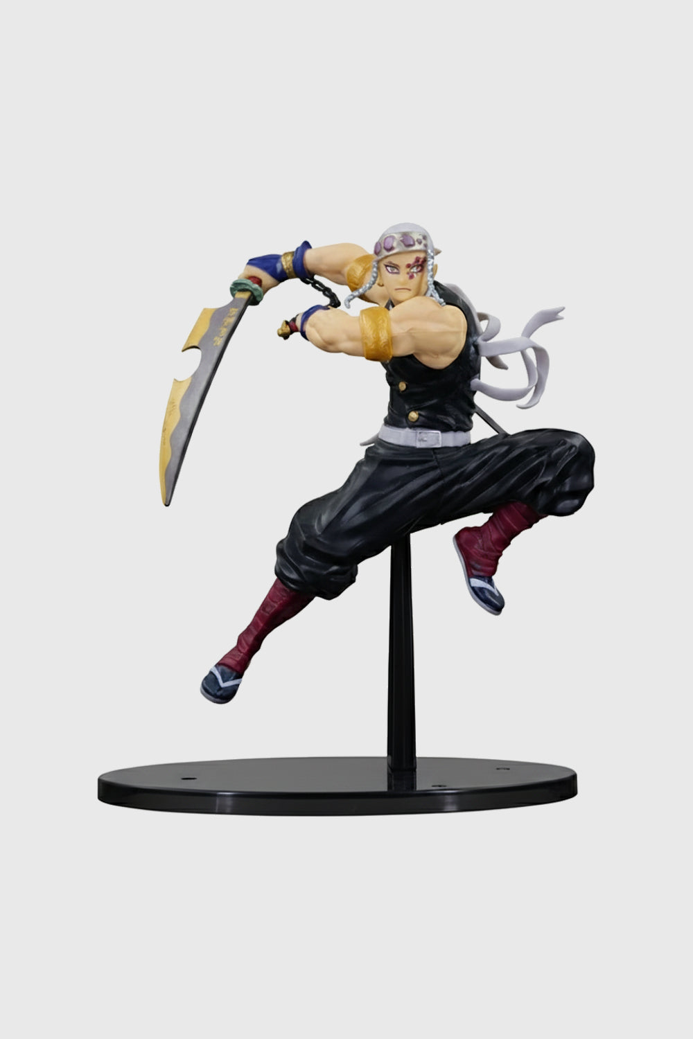 Front view of Tengen Uzui Demon Slayer figure wielding dual blades
