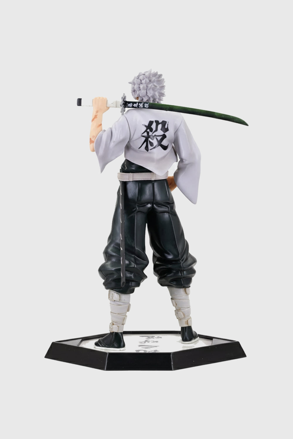 Side profile showing sculpted muscles and flowing attire