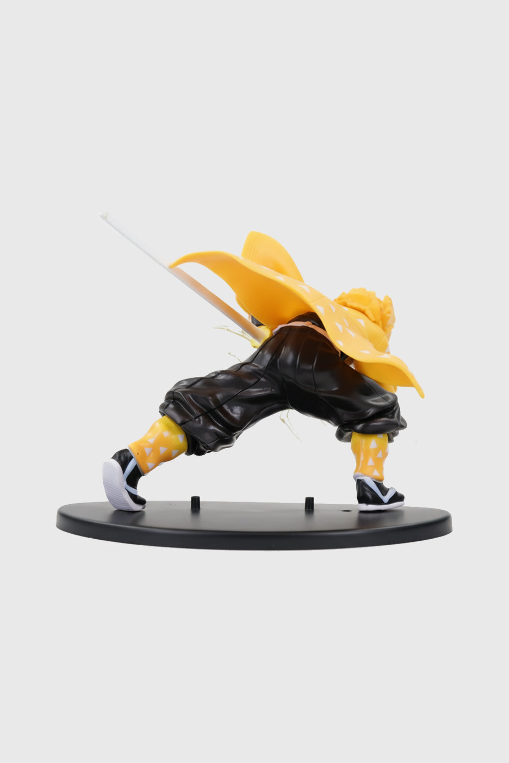 Side view showing Zenitsu’s sword and lightning stance